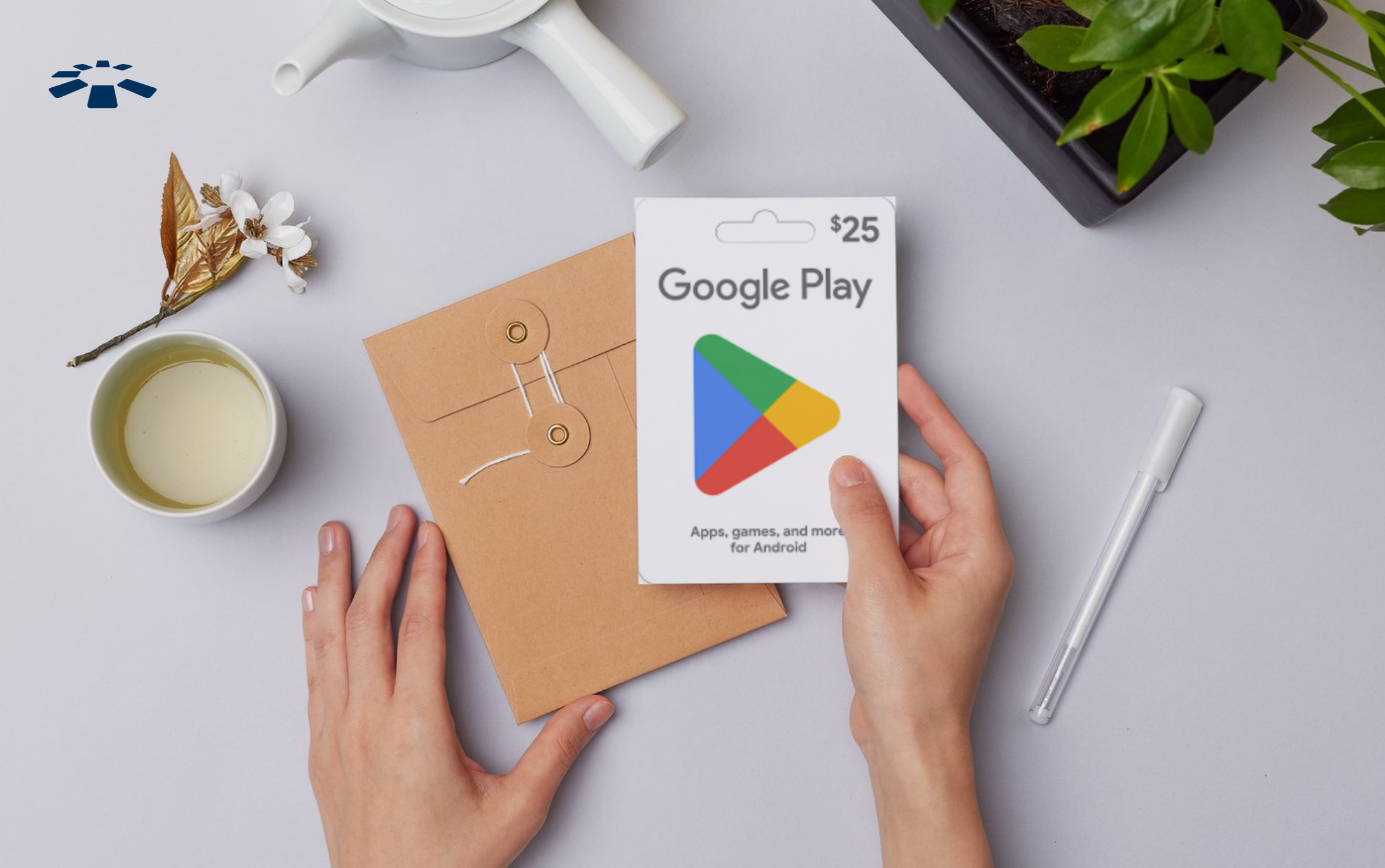 Person holding a Google Play gift card
