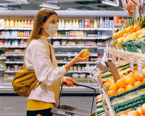 An image of a woman grocery shopping.